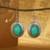 New retro round crystal inlaid turquoise earrings ethnic style flower earrings simple alloy bohemian